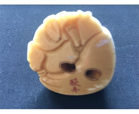 Fine quality Japanese ivory netsuke a Buddha with a fan signed to the base