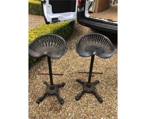 Pair metal tractor seat bar stools