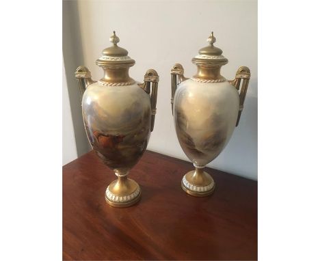 A pair of fine quality Royal Worcester vases and covers highland cattle in a landscape signed John Stinton 35.5 cm high