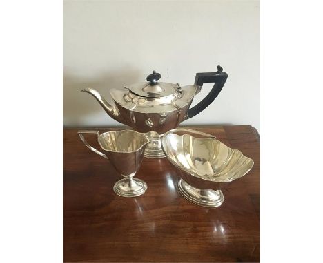 Three piece Birmingham silver tea service by I S Greenberg 1909 teapot 20cm high total approx. weight 26.7 ozt