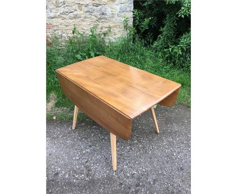 Mid century Ercol dining table with folding leaves