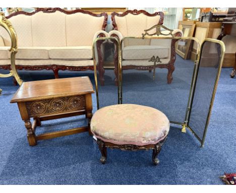 Wooden Storage Box/Stool, with lift up lid, carved floral front, raised on four legs with stretcher.  Together with brass and