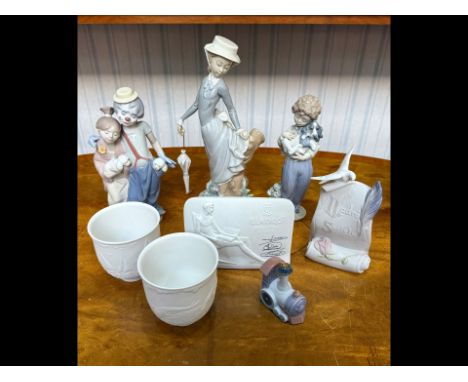 Eight Pieces of Lladro, to include No. 7686 'Pals Forever', 7609 'My Buddy', 4912 'Young Lady in Trouble', two Sailing the Se