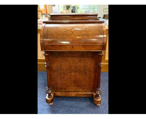 Victorian Walnut Davenport of typical form, fitted interior.  Four side drawers and four dummy drawers. Height 37", width 22"