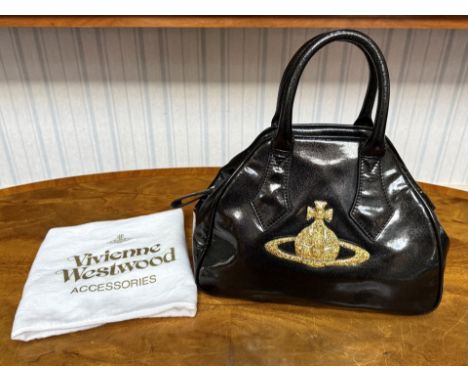 Vivienne Westwood Ladies Handbag.  Rare black gold glitter patent leather with gold glitter orb tote bag.  Gold inner label a