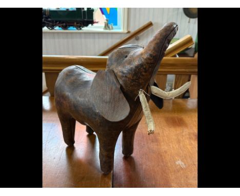Elephant Shaped Brown Leather Footstool, 21" high x 20" wide, as found.