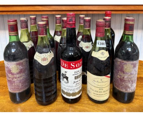 14 Bottles of Red Wine, including Anjou Rouge, Beaujolais and Rioja, some with rubbed or missing labels. Together with a bott
