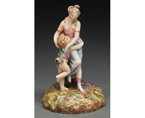 An early Royal Worcester group of Venus and Cupid, 1867, decorated in Raphaelesque colours, on grassy mound, 16cm h, green pr