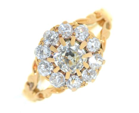 A diamond cluster ring, with old cut diamonds, in gold, 3.7g, size K  Good condition