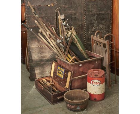 Miscellaneous vintage garden tools, a quantity of golf bags, folding chair, Esso paraffin can and a wooded tool box, the unde