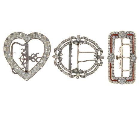 Three paste waist buckles, c1900,&nbsp; including a heart shaped example, another with narrow red guilloche enamel surround, 