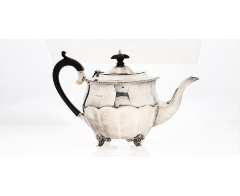 A Victorian silver&nbsp; &nbsp;tea service, panelled oval,&nbsp; on four feet, teapot 15cm h, maker JH, Birmingham 1900, 20oz