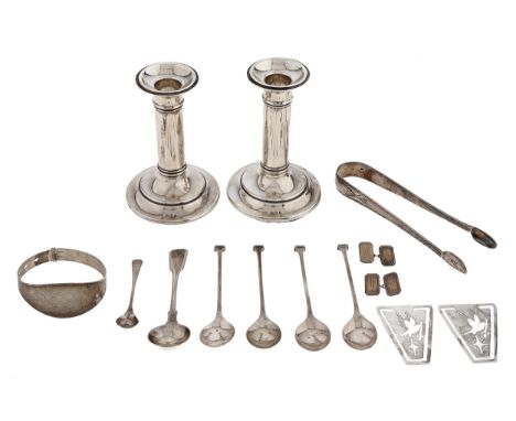 A pair of Edwardian dwarf silver candlesticks, 11cm h, by W H Haseler, Birmingham 1909, loaded, a pair of George III bright c