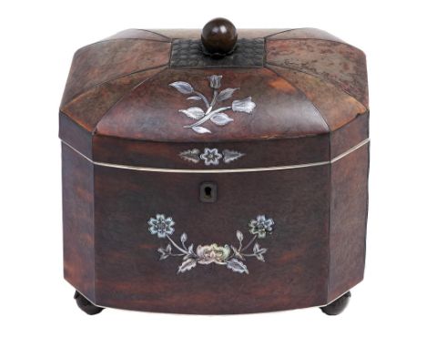 An early Victorian tortoiseshell tea caddy, inlaid in engraved mother of pearl with flowers and wire stringing, the slightly 