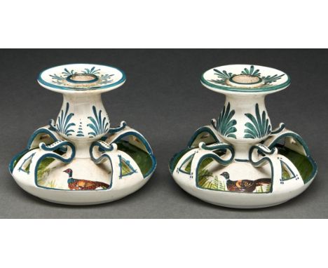 A pair of Wemyss ware Low Kintore candlesticks, c1900, painted with a pheasant, 10cm h, impressed mark  One candlestick with 
