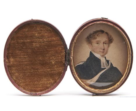 English School, 19th century - Portrait miniature of a Clergyman, watercolour and gum on card, oval, 92mm, morocco case  Good