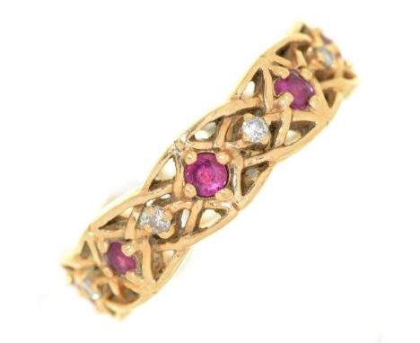 A ruby and diamond openwork band ring, in 14ct gold, &nbsp;by Givenchy for The Franklin Mint, import marked London 1985, 5.2g