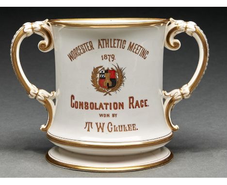 A Royal Worcester loving cup, 1879, painted with flowers and, to the other side, gilt arms and inscription Worcester Athletic