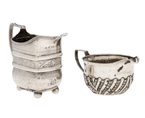 A George III engraved silver cream jug, of oblong form with reeded rim, 85mm h, maker's mark partly rubbed, London 1811 and a