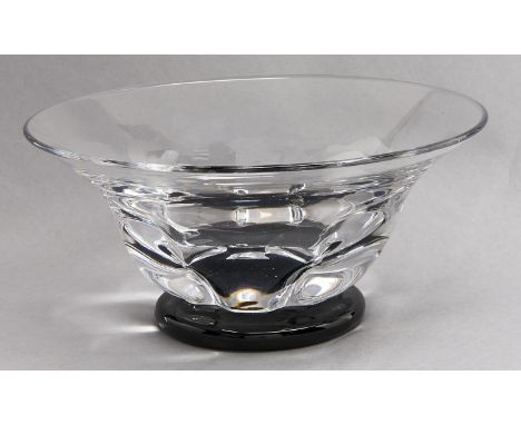 An Orrefors glass bowl designed by Edvard&nbsp; Hald,&nbsp;on black glass foot, 21.5cm diam, engraved marks  Good condition w