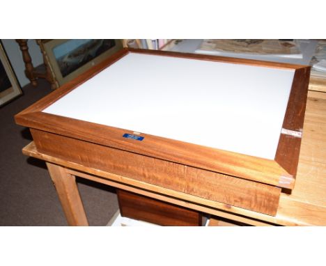 *Light box. A bench standing light box, by Harbral Ltd., with opaque perspex top, within mahogany frame and base, perspex top