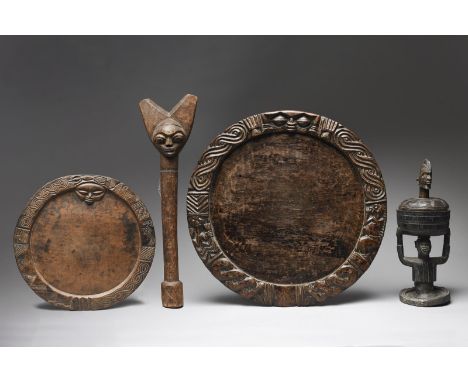 A Yoruba Shango wand Nigeria of janiform with stylised axe blades headdress, with remains of white pigment to the eyes, 54.5c