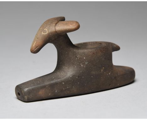 A Woodlands platform pipe Northeast North America modelled as deer with the body as the bowl, with incised features, 11cm lon