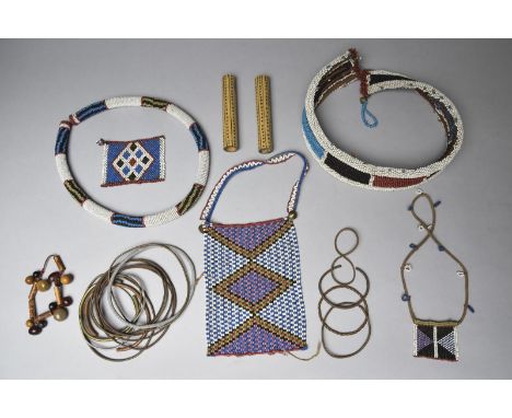 A Zulu single tube beaded waistband South Africa 69cm long, and other Zulu beadwork including a four tube waistband, 25cm dia