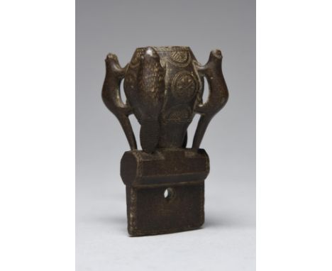 A Micmac pipe bowl North Eastern North America carved stone, the ogee bowl with geometric rondals and relief carved figures o