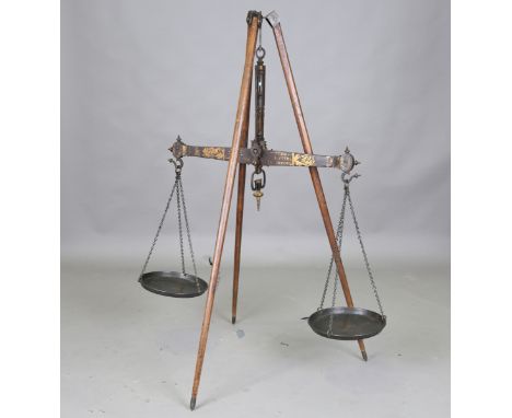 A set of 19th century cast iron travelling customs balance scales by Thomas Cheshire of Liverpool and Lancaster, raised on a 