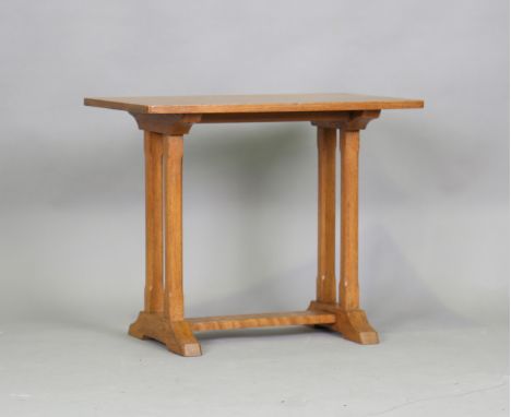 An early 20th century Arts and Crafts oak rectangular occasional table, in the manner of Heals, the underside stamped 'R. Wal