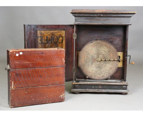 A 19th century stained walnut cased table-top upright penny-in-the-slot Polyphon, the handle-wind mechanism playing 40cm disc