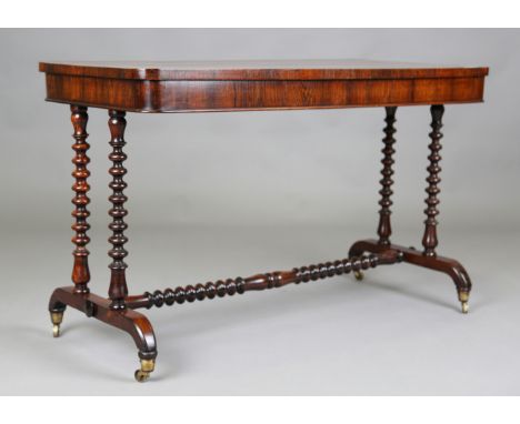 A mid-Victorian rosewood centre table, raised on bobbin turned supports and bracket feet, height 71cm, width 115cm, depth 55c