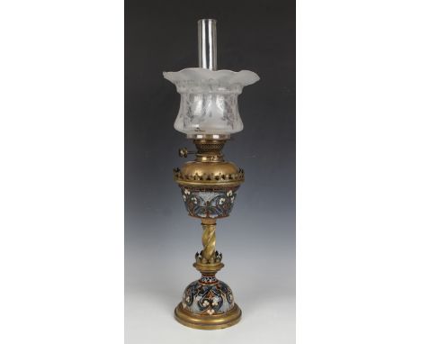 A Doulton Lambeth gilt metal mounted stoneware table oil lamp, circa 1883, decorated by Edith Lupton, monogrammed, the domed 