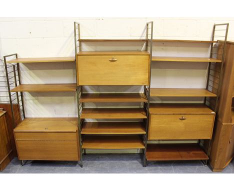 A mid-20th century teak and gilt painted metal Ladderex wall unit of retro design, the modular system comprising four ladder 