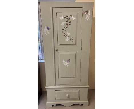 A vintage solid pine 2 part wardrobe, painted grey with stencilled painted design and butterfly stickers. Interior has had 3 