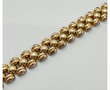 A vintage Swiss design 20 microns gold plate popcorn style bracelet with push clasp. Makers marks and gold plate mark to insi