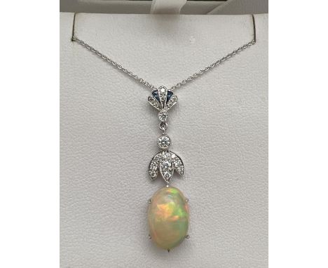 A 18ct white gold Art Deco style diamond, sapphire and opal set necklace by Luke Stockley, London. A drop style pendant set w