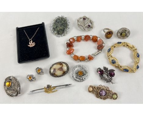 A collection of Scottish costume jewellery items, many natural stone set, to include Miracle. Lot includes: brooches, rings, 