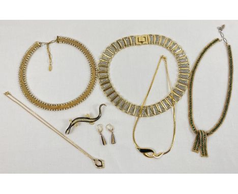 A collection of gold tone vintage jewellery. To include stone set necklaces, Lizzard brooch and a Cleopatra style necklace. 