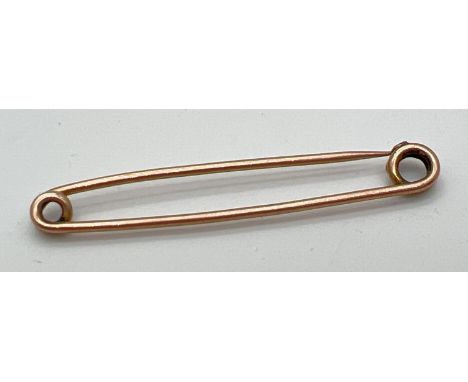 A vintage 9ct gold kilt pin, stamped '9ct' to hook. Approx. 5.2cm long, weighs approx. 2.4g. 