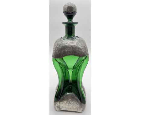 An Art Nouveau Holmegaard glass Kluk Kluk decanter with pewter overlay. Attributed to Jacob Bang, pewter overlay to base coll