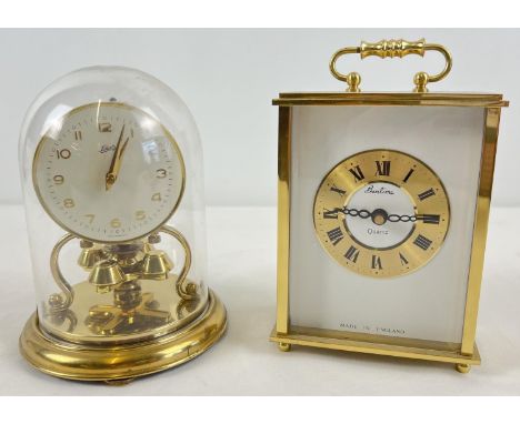 A vintage brass cased Bentima quartz carriage clock together with a Schatz &amp; Sohne Anniversary clock. Carriage clock appr