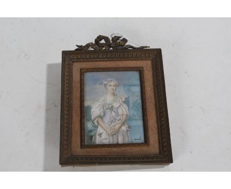 19th Century miniature portrait on ivory, of a young lady wearing a white dress, signed Berval, housed within a gilt ribbon t