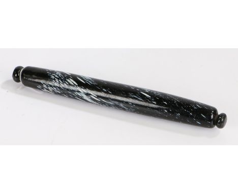 19th Century glass rolling pin, the black body with white fleck decoration, 38cm wide