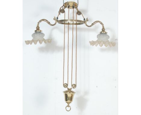 A good 20th century Dutch brass light in a manner of a 18th &nbsp;century chandelier having two scrolled decorated arms with 