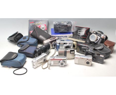 A collection of digital cameras and 35mm cameras to include Kodak easy share, Olympus C-310 zoom, Halima, Franka AF-300,Canon