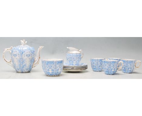 A 19th century Victorian Blue and white Aynsley Engle ceramic tea service for four comprising of four cups and saucers, teapo