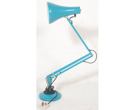 A retro vintage 20th Century Herbert Terry Anglepoise industrial desk lamp finished in teal enamel colourway. Raised on circu