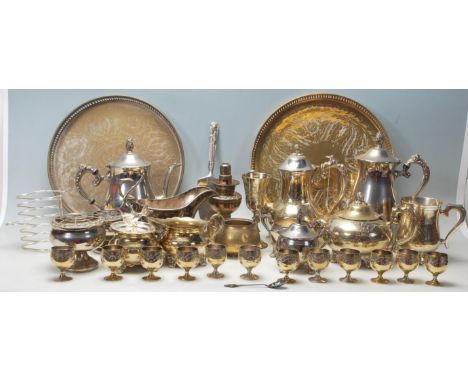 A large quantity of silver plated flatware comprising serving try, tea pot, toaster rack, creamer jug and many more.